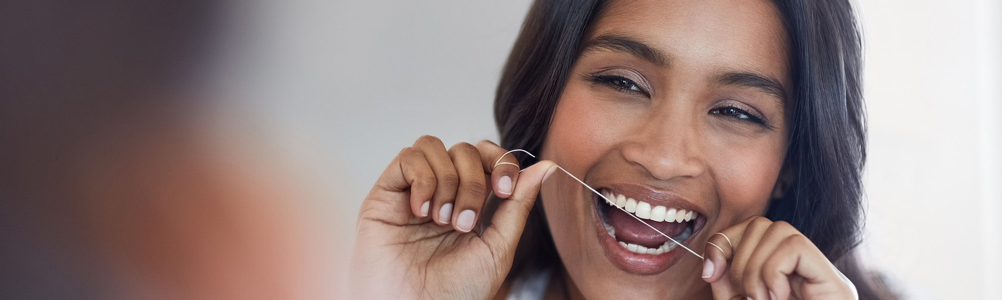 Which Is Better? Water Flossers vs. String Floss